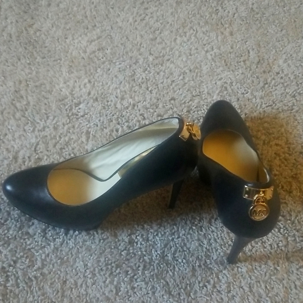 MK black leather shoes.